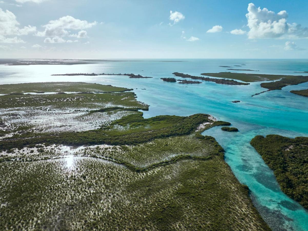 Como Parrot Cay Sandy Point Bagian luar foto